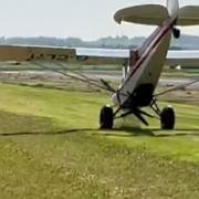 The plane flipped after the propeller caught in the ground