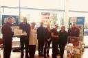 Staff and collectors from Whitchurch's Sainsbury's and the Foodbank 