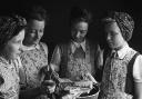 Wem schoolchildren learning domestic skills and gardening in 1947. Picture: Geoff Charles Collection.