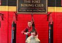 Daniel Bailey and Archie Hughes get ready for the head shave at Fort Boxing Club.