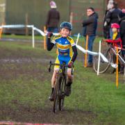 Isaac celebrates retaining his Cyclocross title.