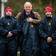 Whitchurch Rugby Club supporter Nick Rothwell, presents second team captain Bryan Torskji and manager Darren Blackhurst with a set of substitute suits for use by the second team. Picture by Michael Wincott Photography