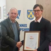 Andrew Hawke, right, received the club of the year award for Wem Tennis Club from Tennis Shropshire president Keith Smith. Andrew also collected the volunteer of the year award on behalf of Wem’s Peter Hughes.