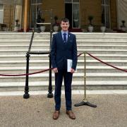 Adam May went to Buckingham Palace to celebrate achieving his Gold Duke of Edinburgh's Award