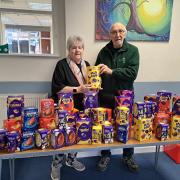 Shropshire councillor Peggy Mullock oversees the donation to Alan Strutt.