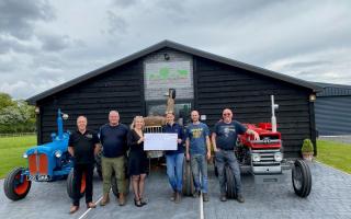 Coton Meadows presented a £100 donation to the five participants.
