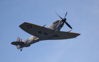 The spitfire passing over Marbury Merry Days.