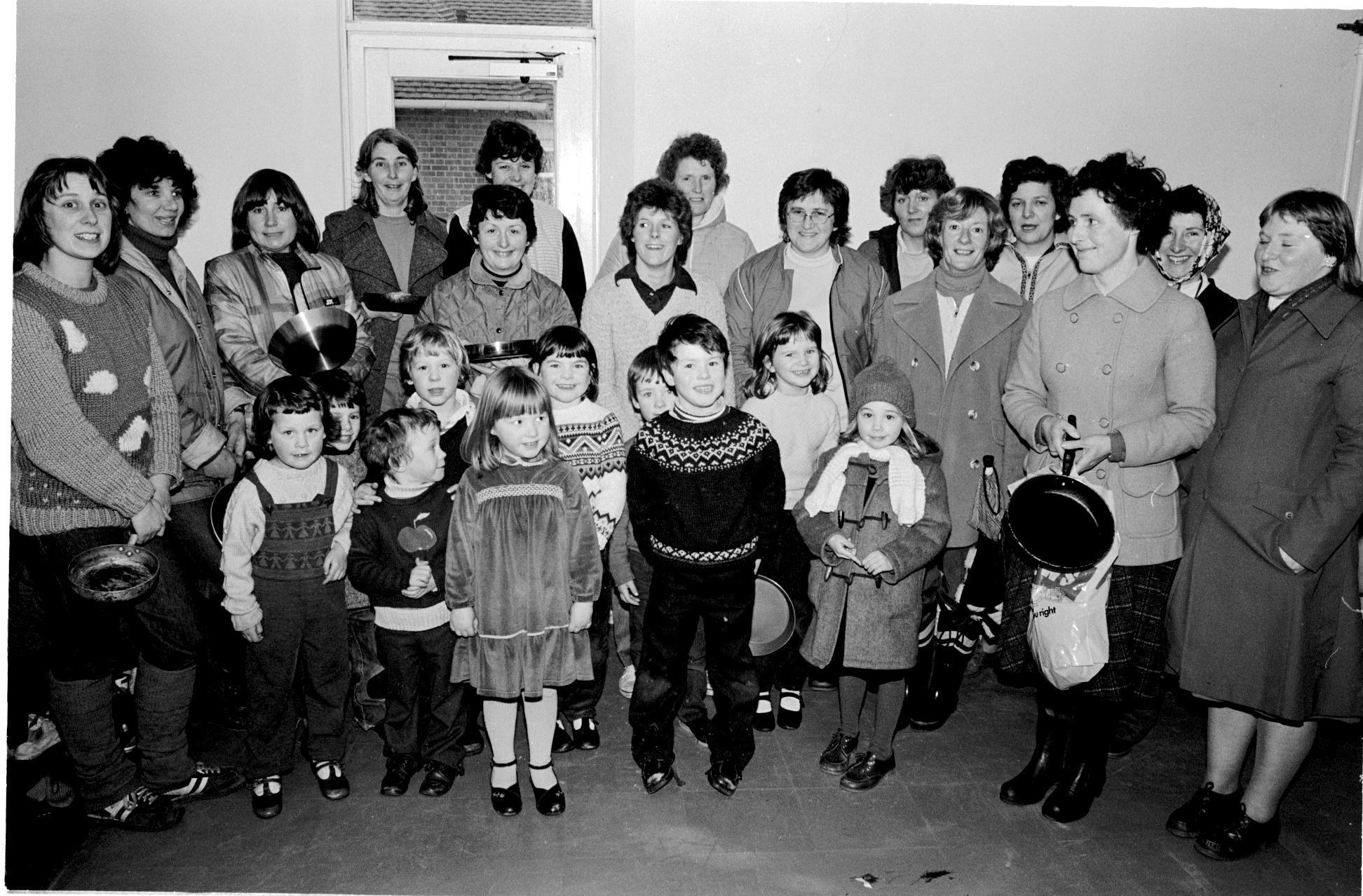 Parents and pupils from Criftins Primary School prepare for a pancake race in 1983.