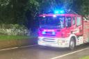 Firefighters were called out after a person was trapped in a car in Ellesmere.