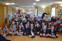 The choir of Whitchurch CE Junior Academy sang for residents in Greenfields Care Home.