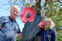 Ready to raise money: Ellesmere’s new Poppy Appeal organiser Caroline Ford with Legion branch chairman Bob McBride and the ‘Silent Soldier’ outside the town’s Comrades Club