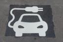 Electric vehicle charger space, painted on road