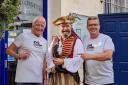 Whitchurch Rotary president Graham King (left) and the Mayor, Andy Hall, point out their 85th anniversary T-shirts to the ‘Town Pirate’ Guy Hepworth.