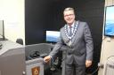 Whitchurch mayor Cllr Andy Hall with the flight simulator.