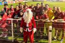 Father Christmas with the Whitchurch Alport players on Saturday.