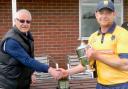 Shropshire’s Graham Wagg, pictured receiving the the Wilfred Rhodes Trophy by Nick Archer, the chairman of the National Counties Cricket Association, in recognition of his performances last season.