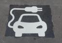 Electric vehicle charger space, painted on road