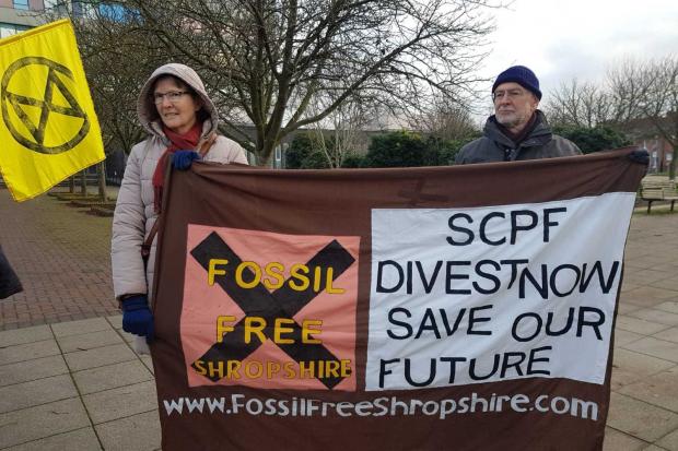 Fossil Free Shropshire staged a protest outside Shirehall ahead of the meeting on Monday.