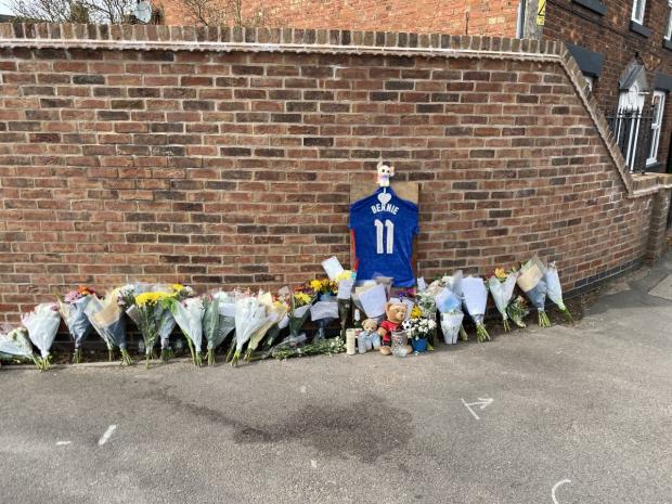 Whitchurch Herald: Tributes left to Craig Lear-Jones in Wem.