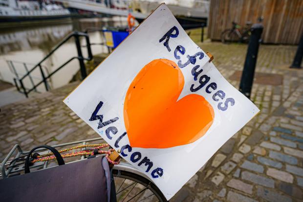 Whitchurch Herald: Refugees welcome sign. Credit: PA