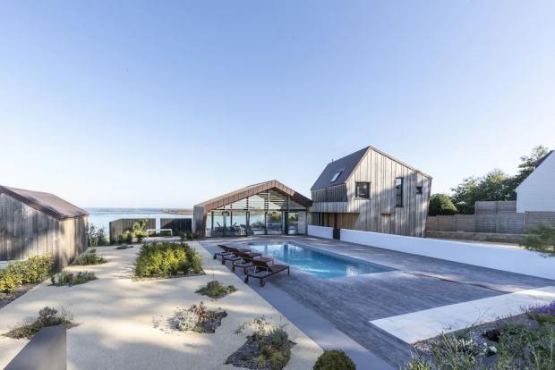 Whitchurch Herald: Modern villa with stunning sea views, swimming pool, Jaccuzi - Brittany, France. Credit: Vrbo