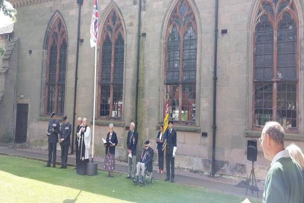 Armed Forces Day service taking place outside St Peter and St Paul Church in Wem.