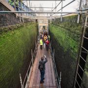 Visitors in a drained lock