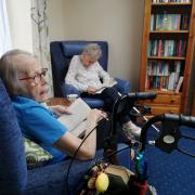 Pictured are the first book reading devotees (front to back) Doreen Nall & Mary Lloyd-Jones enjoying their quiet time and a good novel in the newly created library at Prospect House Care Home.