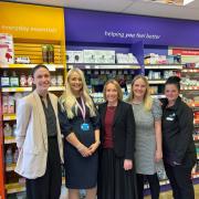 Helen Morgan with staff of Rowlands Pharmacy in Wem.