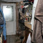 The conditions where an Africa Grey Parrot was kept in 'filthy' conditions. Picture by RSPCA/West Mercia Police.
