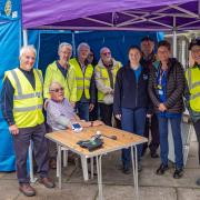 Whitchurch Rotary Club members with patients and healthcare professionals.