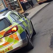 Police in Whitchurch High Street.