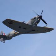 The spitfire passing over Marbury Merry Days.