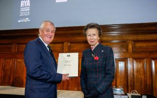John Ridgers receives his award from Her Royal Highness, Anne, The Princess Royal.